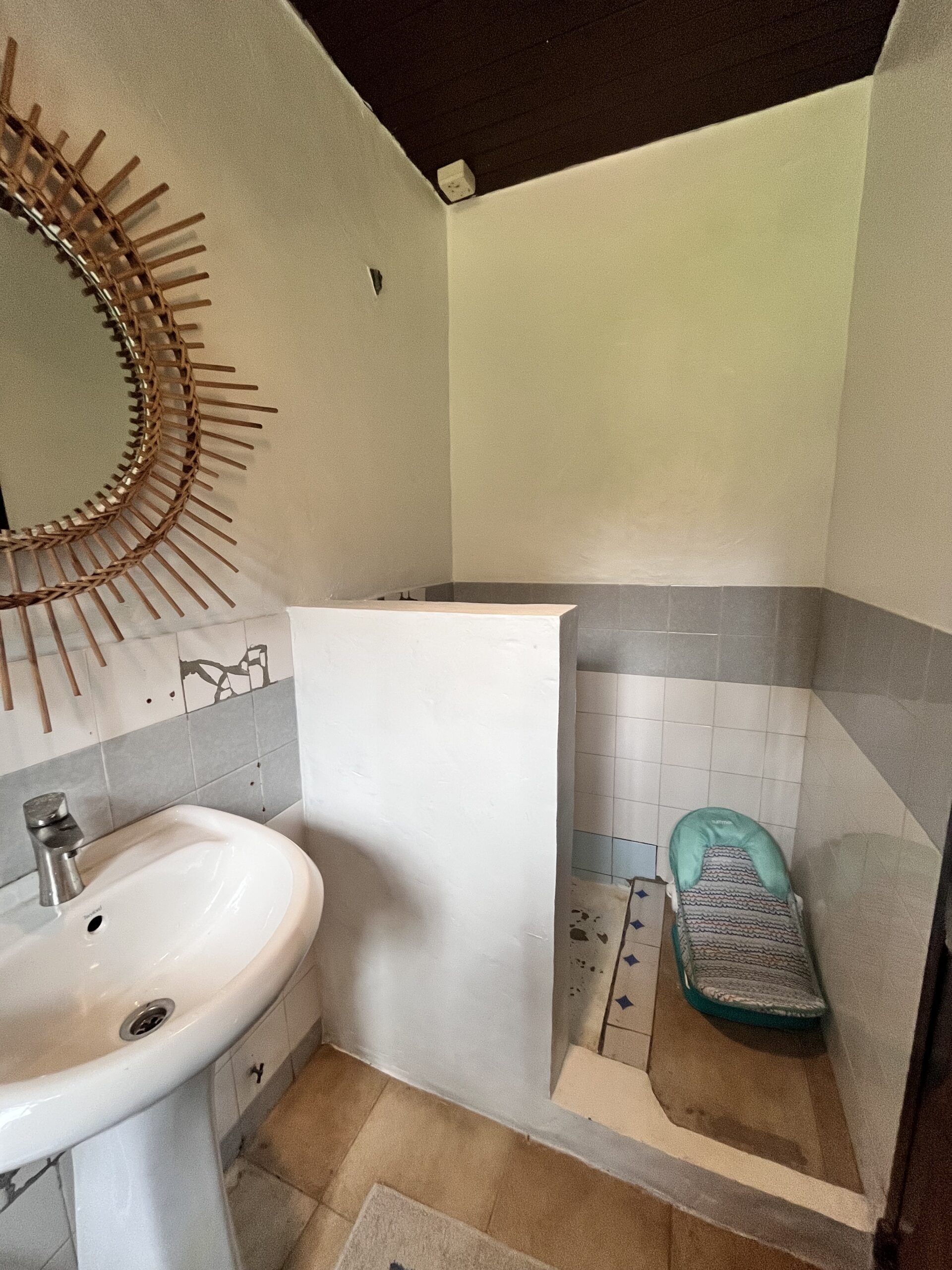 Library bathroom with shower.